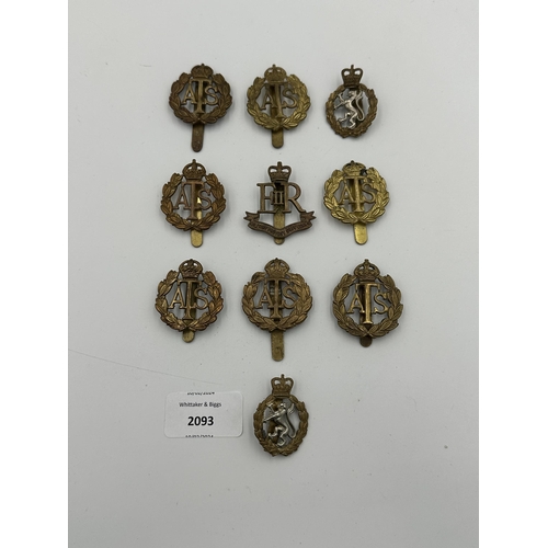 2093 - Ten military cap badges