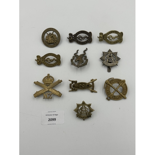 2099 - Ten military cap badges