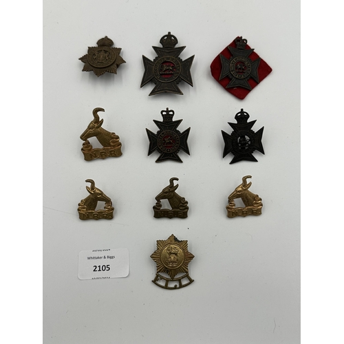 2105 - Ten military cap badges