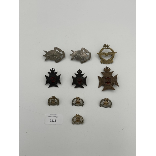 2112 - Ten military cap badges