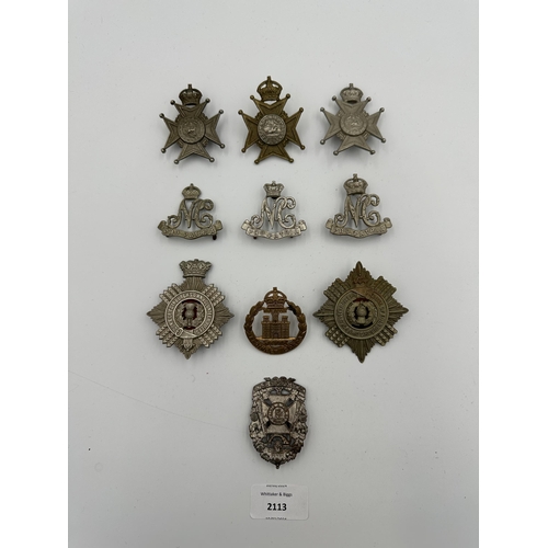 2113 - Ten military cap badges