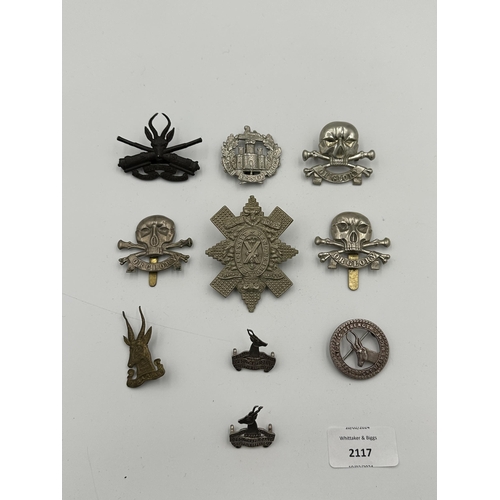 2117 - Ten military cap badges