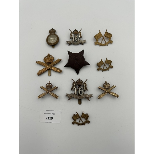 2119 - Ten military cap badges