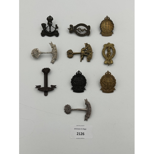 2126 - Ten military cap badges