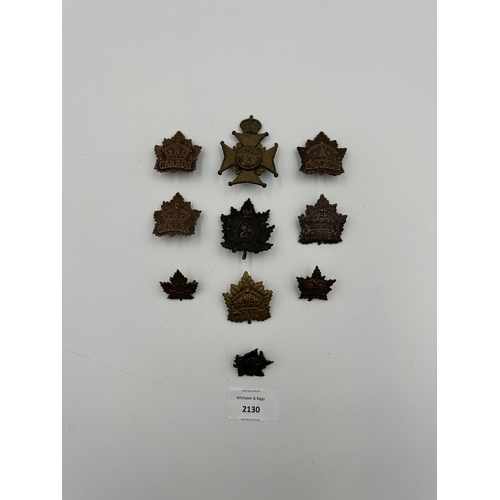 2130 - Ten military cap badges