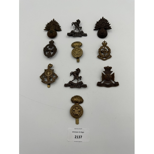 2137 - Ten military cap badges