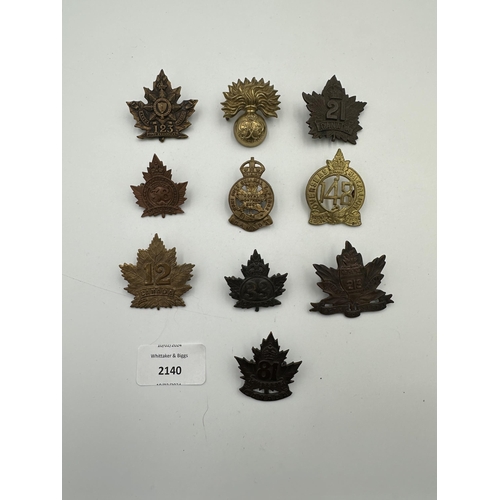 2140 - Ten military cap badges