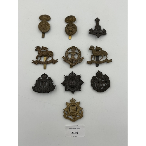 2149 - Ten military cap badges