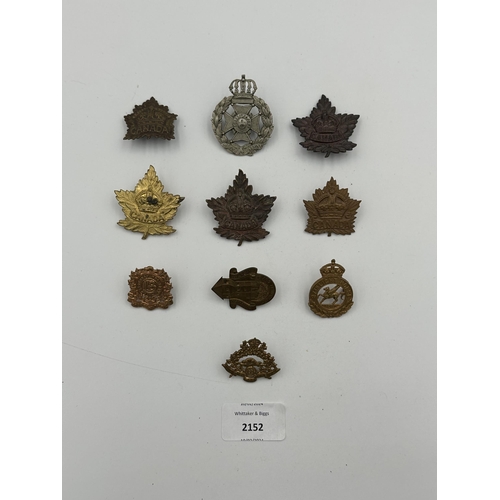 2152 - Ten military cap badges