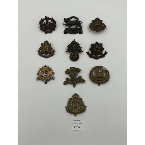 2156 - Ten military cap badges