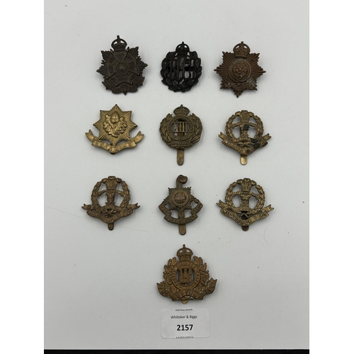 2157 - Ten military cap badges