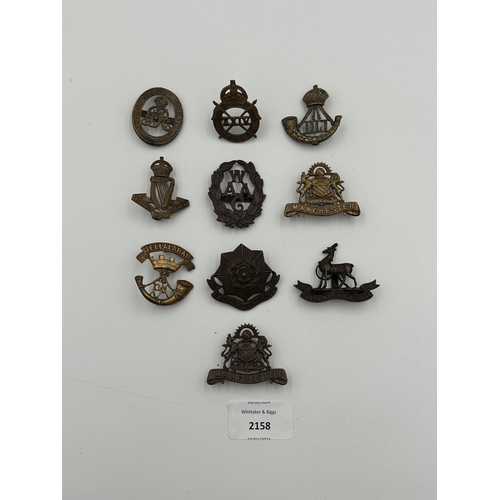 2158 - Ten military cap badges