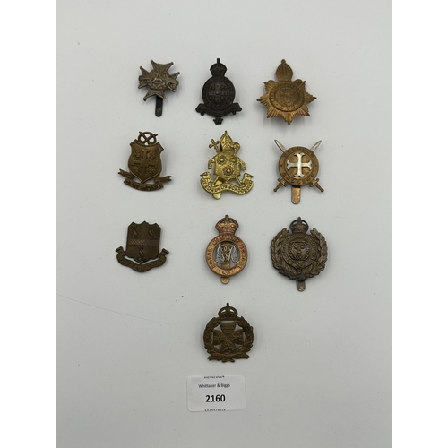 2160 - Ten military cap badges