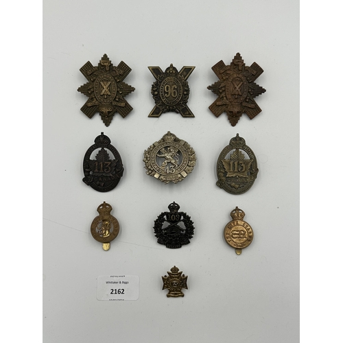 2162 - Ten military cap badges