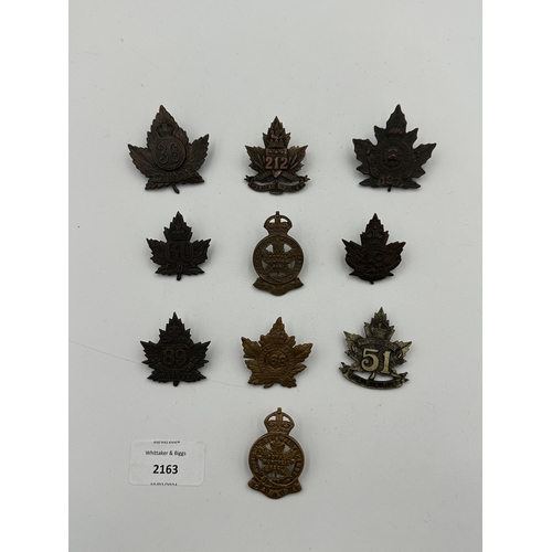 2163 - Ten military cap badges