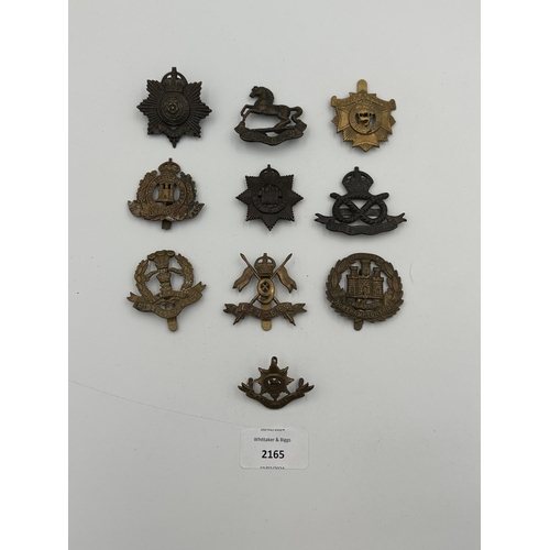 2165 - Ten military cap badges