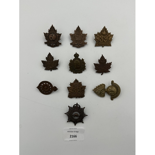 2166 - Ten military cap badges