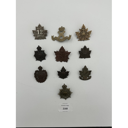 2168 - Ten military cap badges