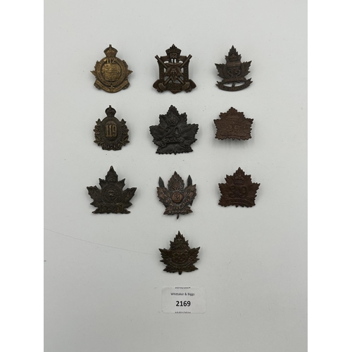 2169 - Ten military cap badges