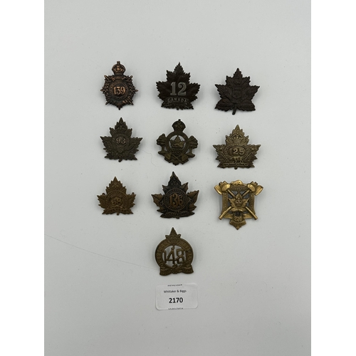 2170 - Ten military cap badges