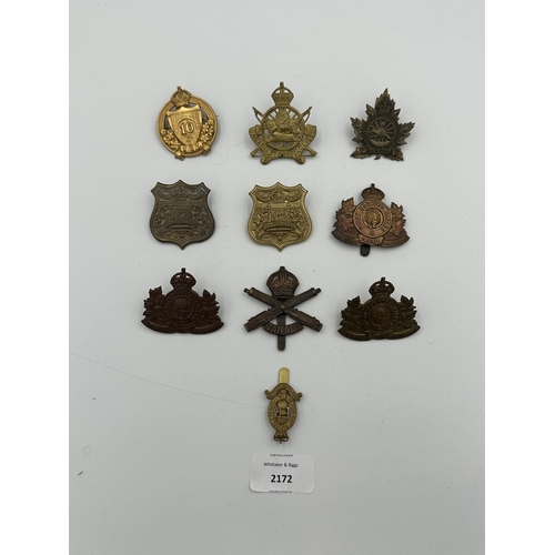 2172 - Ten military cap badges