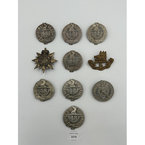 2173 - Ten military cap badges