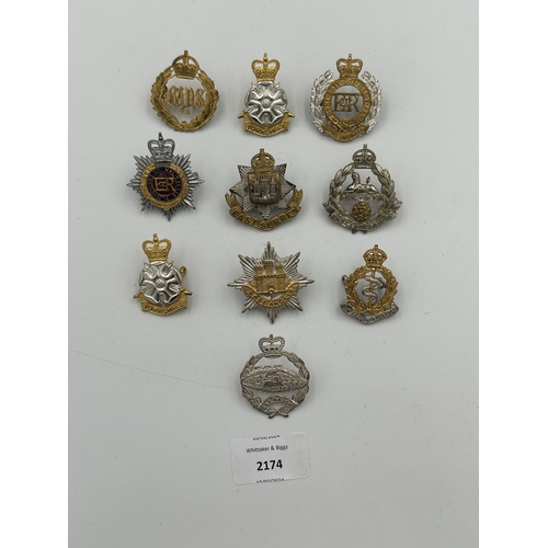 2174 - Ten military cap badges