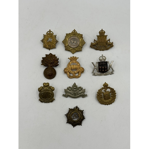 2179 - Ten military cap badges