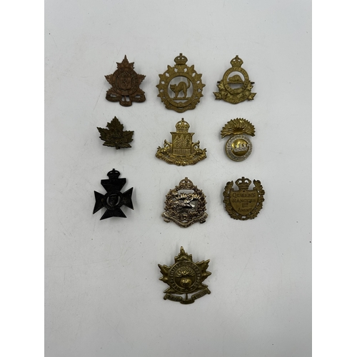 2182 - Ten military cap badges