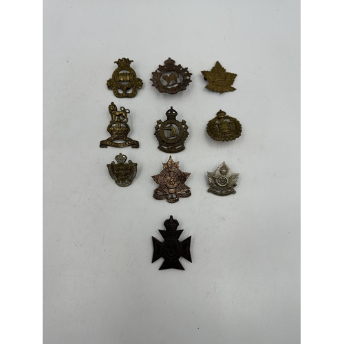 2183 - Ten military cap badges