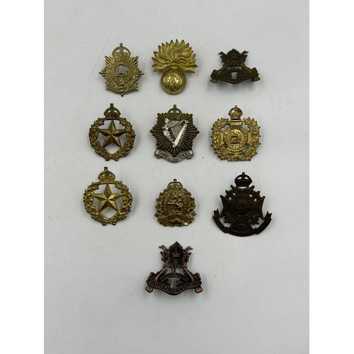 2189 - Ten military cap badges