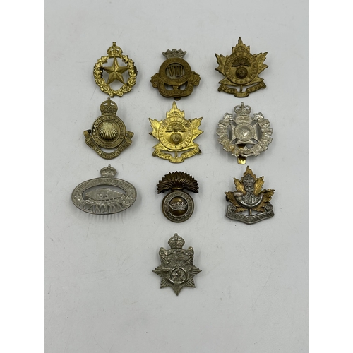 2190 - Ten military cap badges