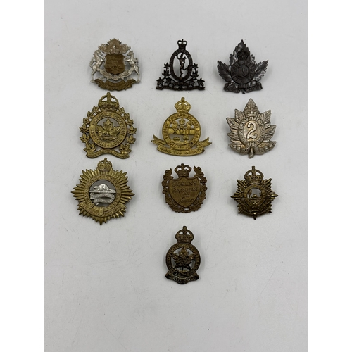 2193 - Ten military cap badges