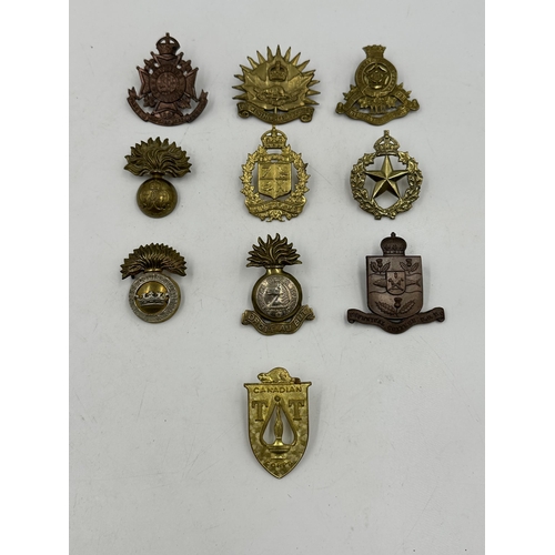 2195 - Ten military cap badges