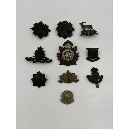 2208 - Ten military cap badges