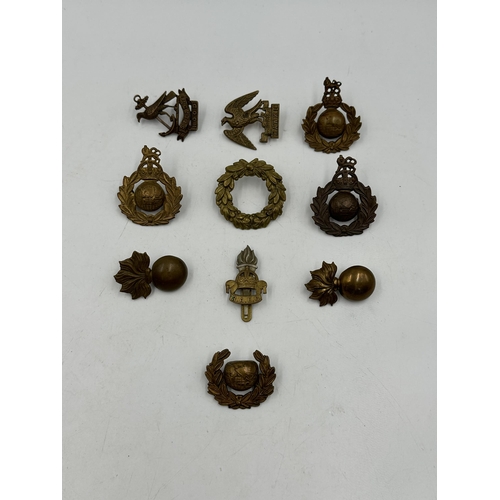 2210 - Ten military cap badges