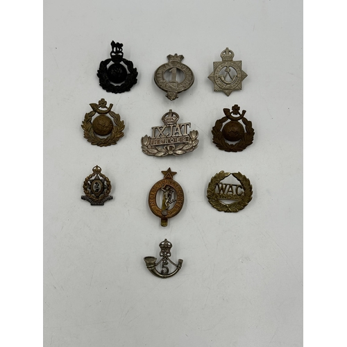 2211 - Ten military cap badges