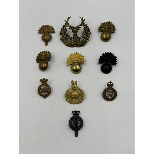 2212 - Ten military cap badges