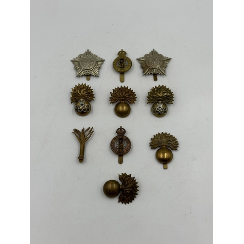 2213 - Ten military cap badges