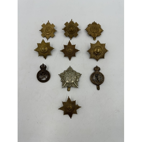 2215 - Ten military cap badges