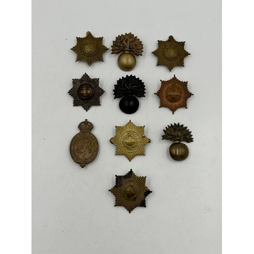 2218 - Ten military cap badges