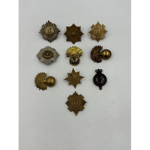 2219 - Ten military cap badges