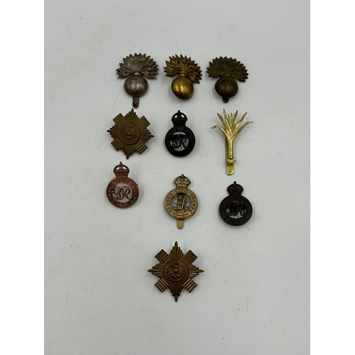 2221 - Ten military cap badges