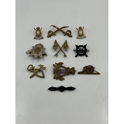 2226 - Ten military cap badges