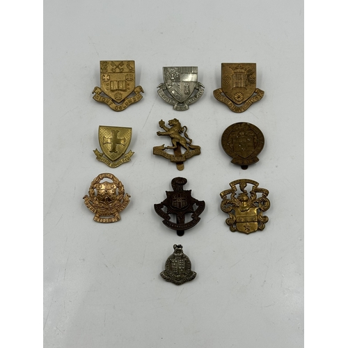 2228 - Ten military cap badges