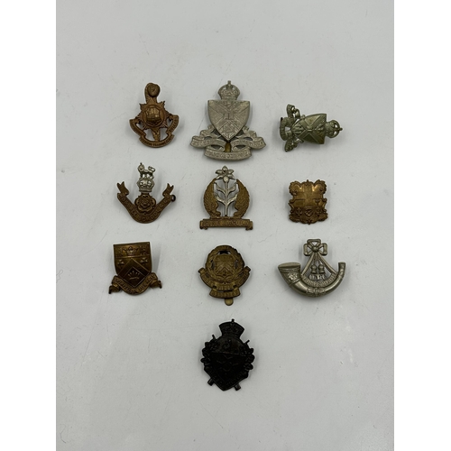 2230 - Ten military cap badges