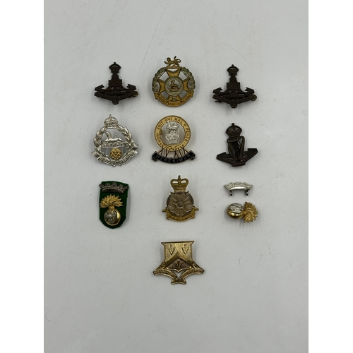 2232 - Ten military cap badges