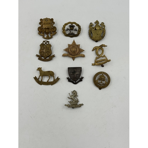 2234 - Ten military cap badges