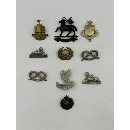 2235 - Ten military cap badges