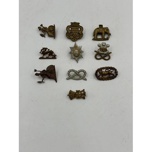 2237 - Ten military cap badges